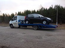 Фото процесса перевозки авто на платформе эвакуатора